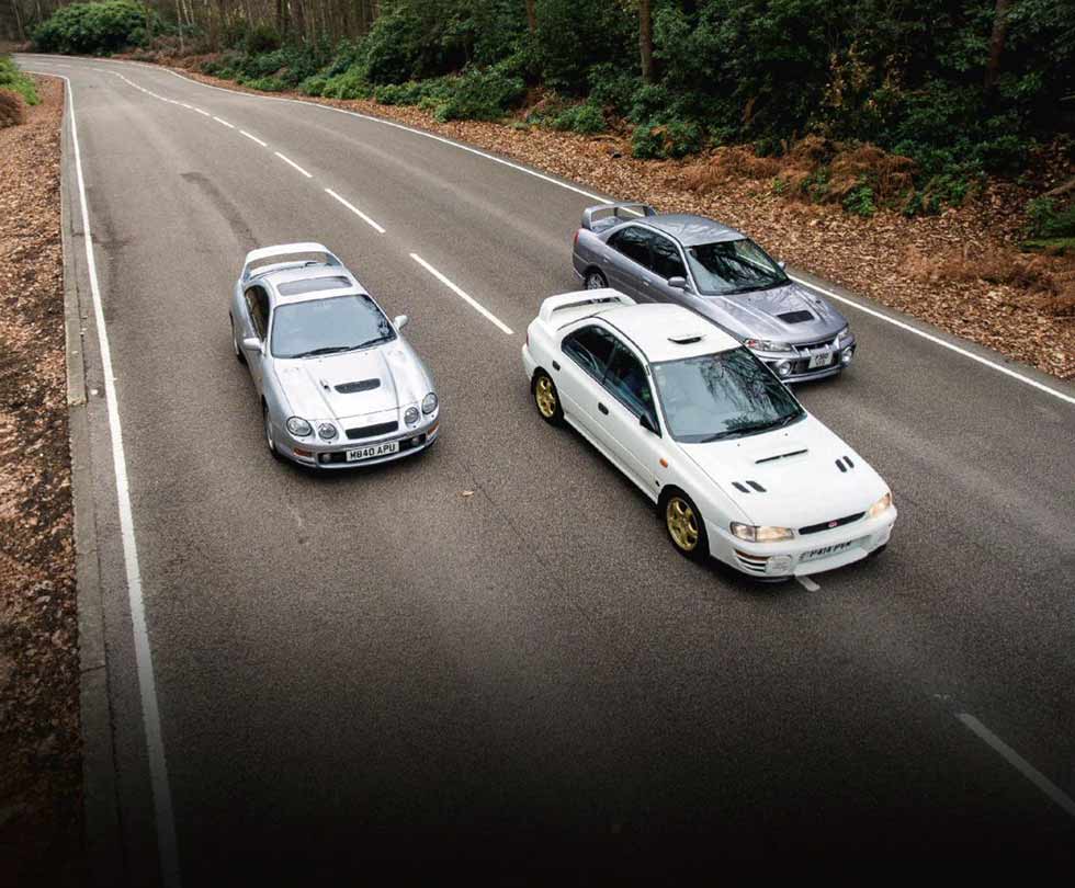 1994 Toyota Celica GT-Four (ST205) vs. 1997 Subaru Impreza WRX Type RA STI Version III and 1997 Mitsubishi Lancer Evolution IV GSR - Japanese rally replicas