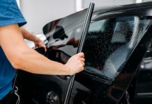 Windscreen Tinting: Benefits, Maintenance, And Legal Considerations Window tinting technician