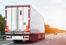 Navigating Financial Highways: A Guide to Truck Factoring for New Trucking Businesses trucking company operator on the highway
